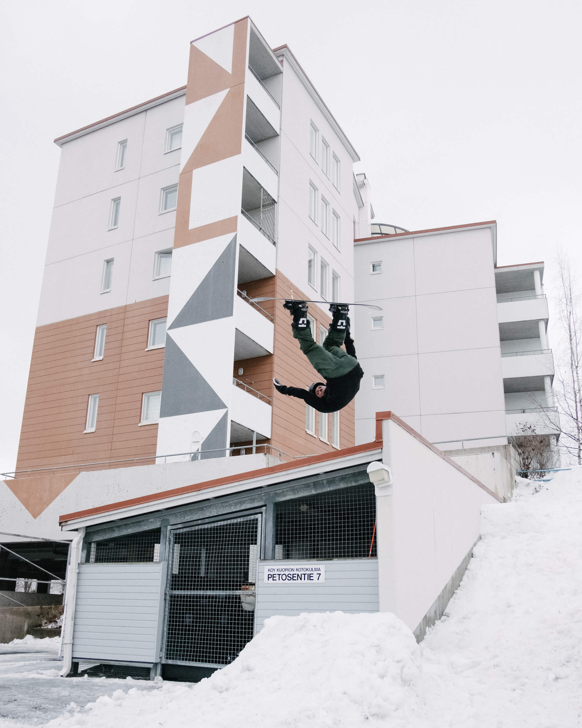 Snowboarder front flip